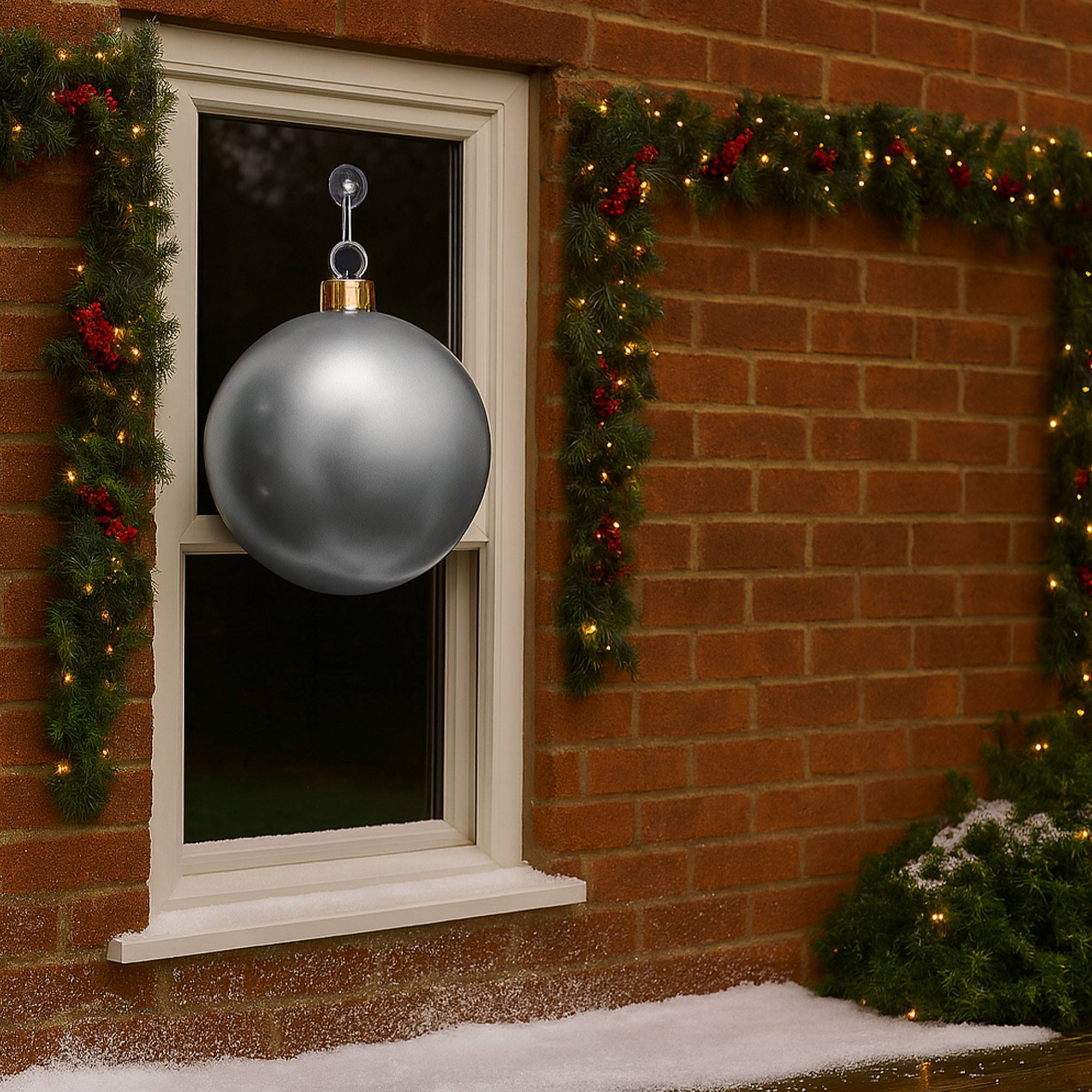 Bola de navidad inflable plateada de 6,5cm con ventosa