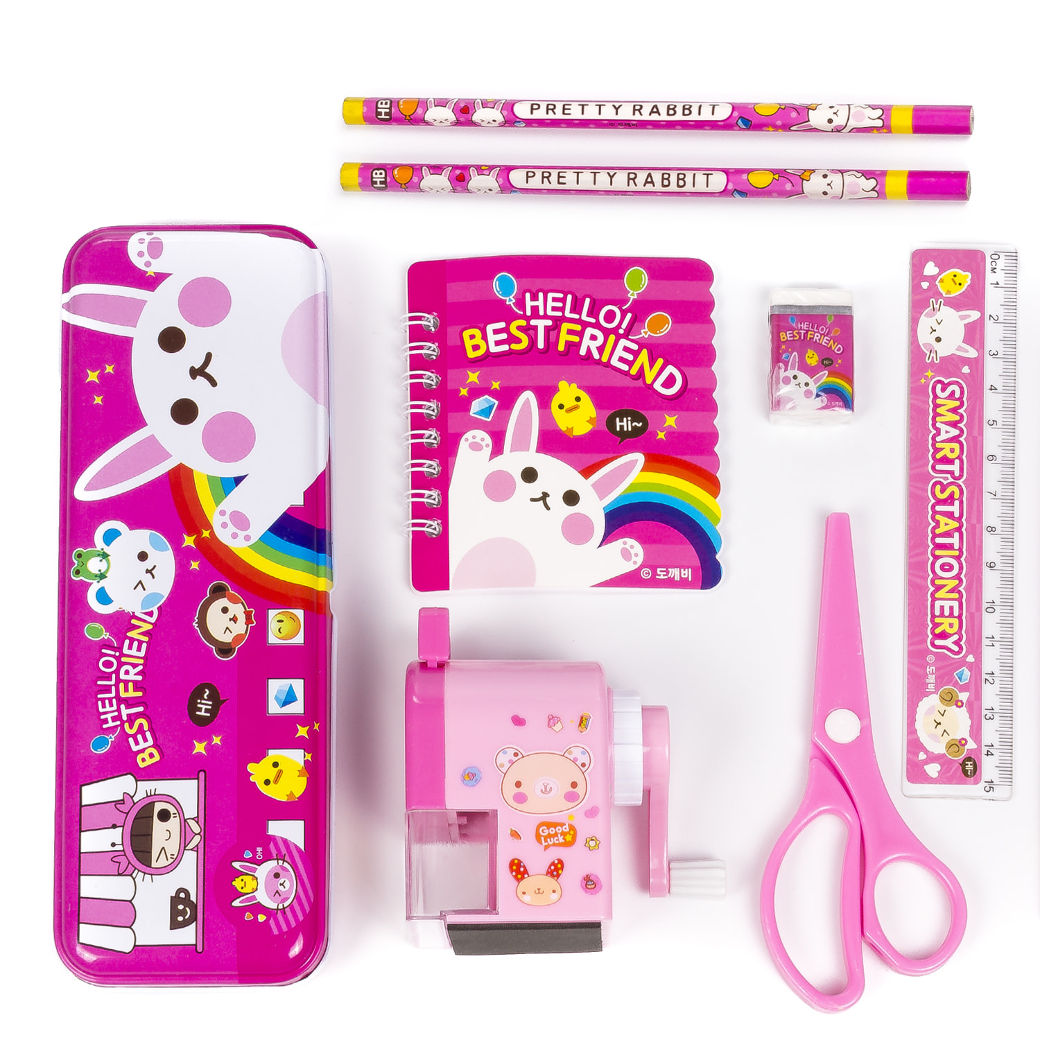 Set di cancelleria con custodia in metallo e accessori per la scrittura.