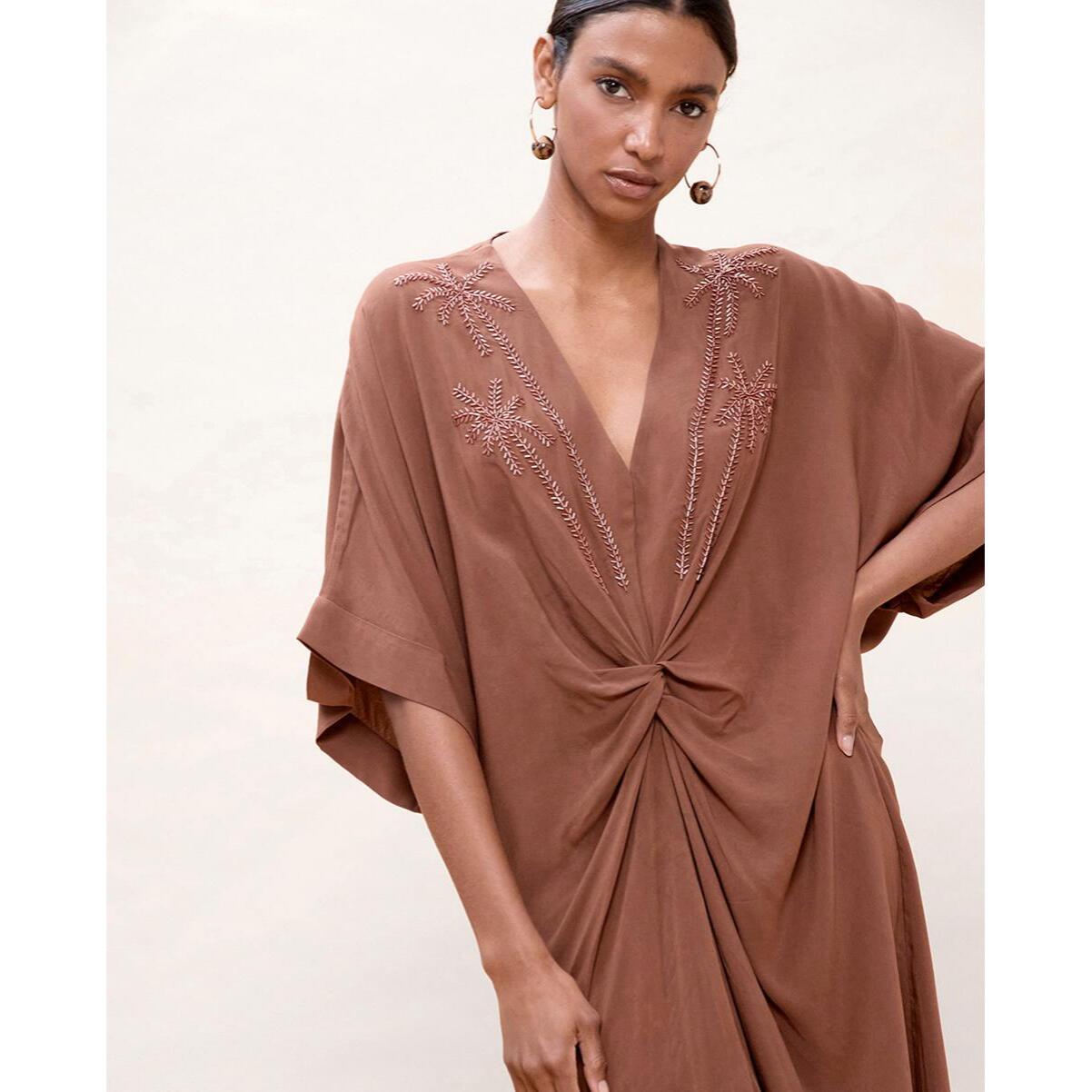 Abito midi in lino annodato