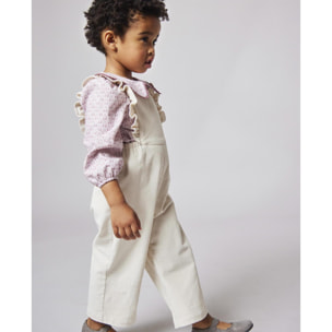 Peto con volantes blancos