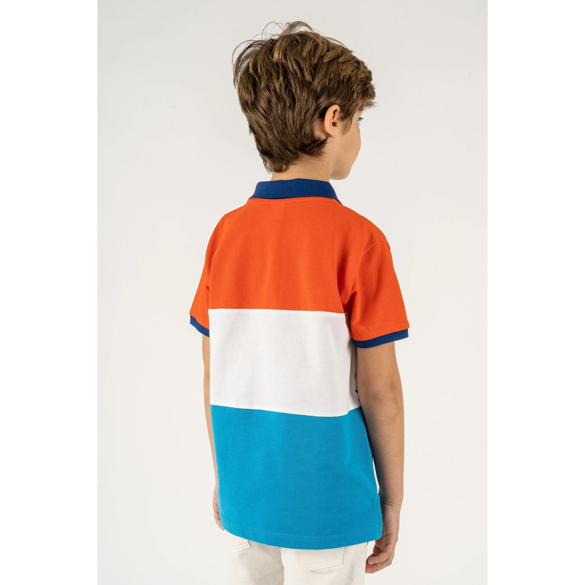 Polo de niño tricolor