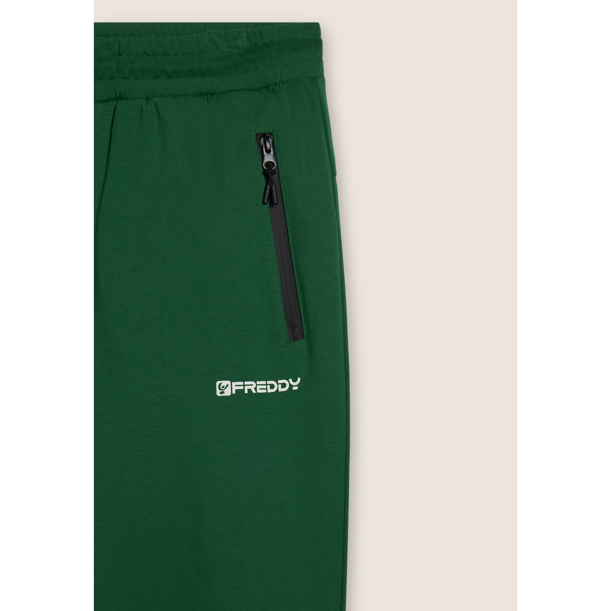 Pantaloni a carota in interlock con zip laterali