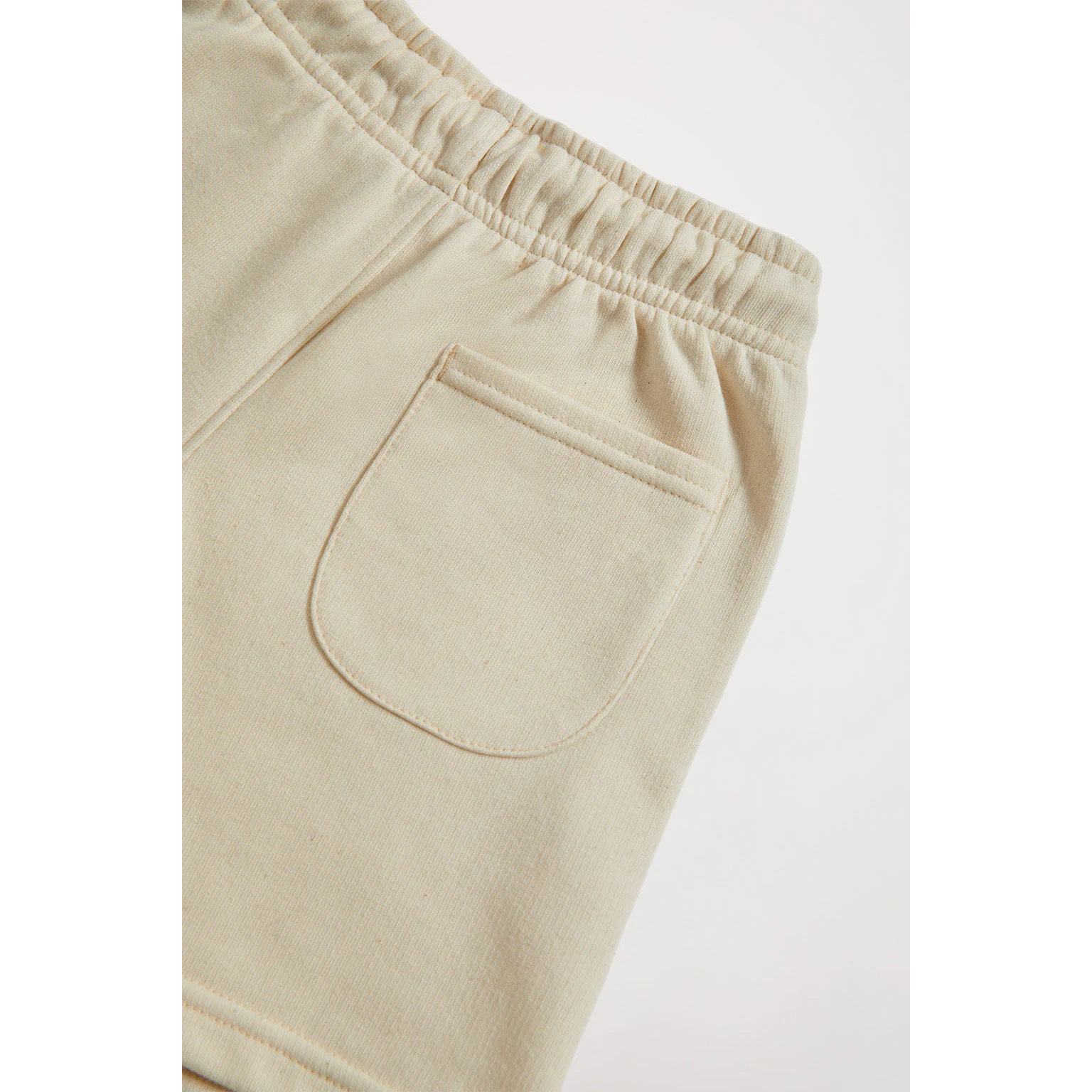 Pantalón corto orgánico beige Neutrals kids con logo