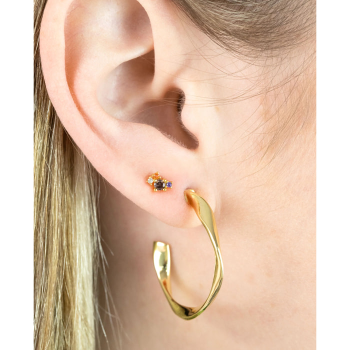 Piercing dorado con piedras de colores