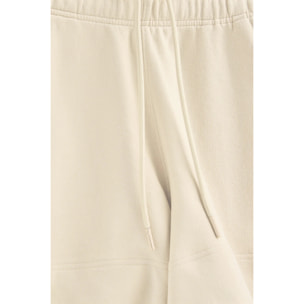 Pantaloncini in cotone ecrù con logo ricamato