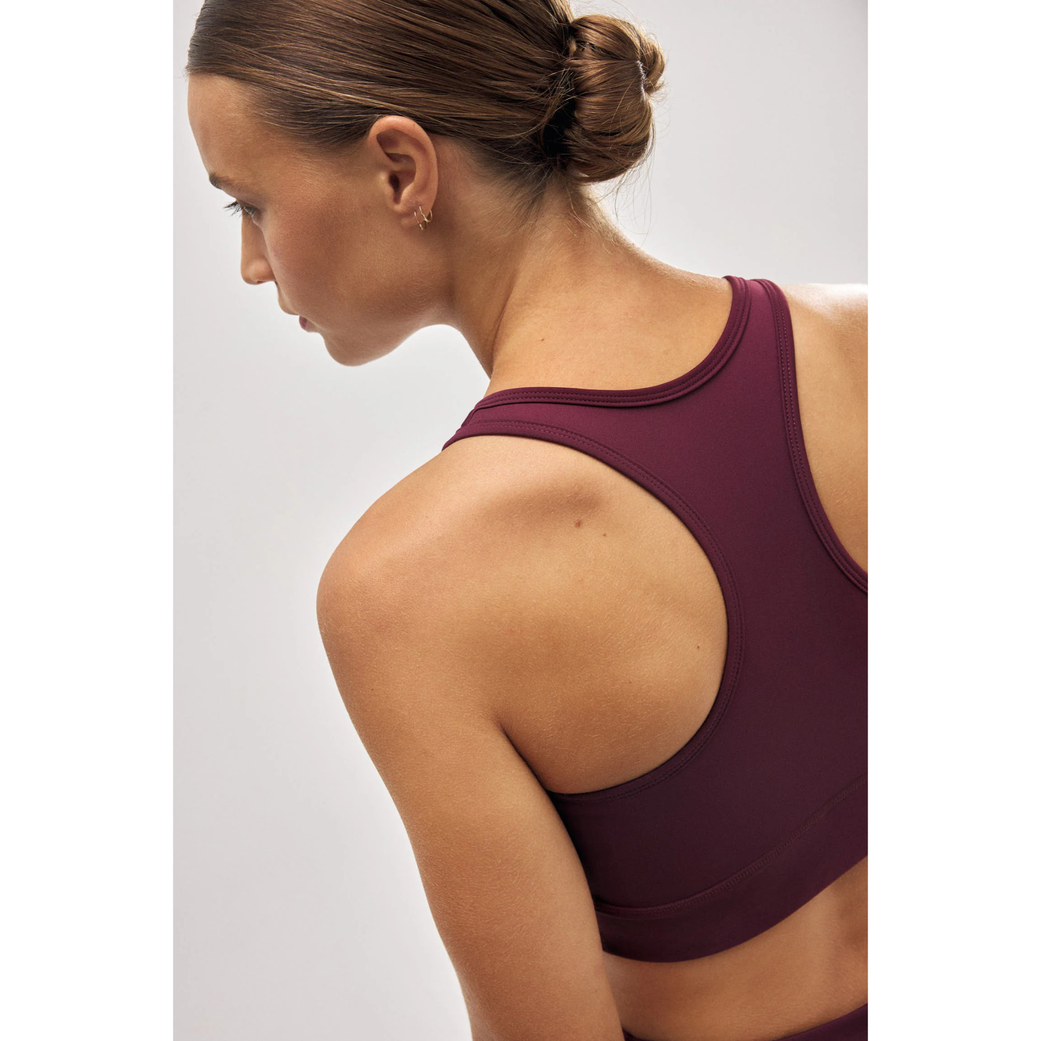 Reggiseno sportivo bordeaux con schiena incrociata