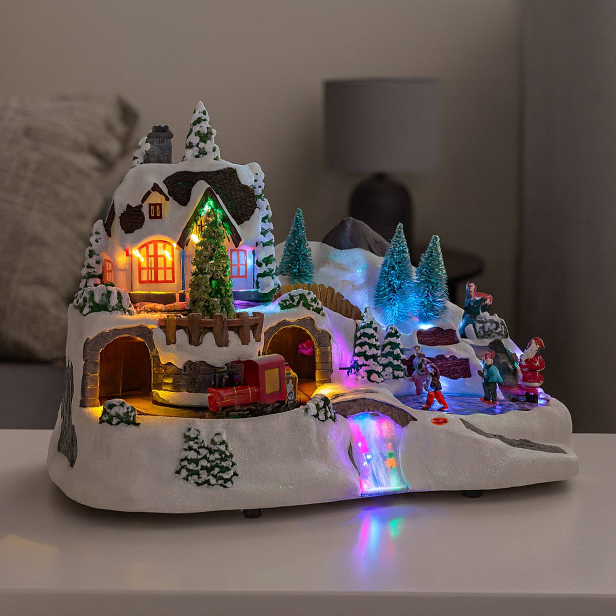 Pueblo navideño para decoración con escena en movimiento y luces led 37x22,5x25,7cm