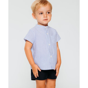 Bermuda de lino azul marino. Bolsillos falsos y botones, cintura elastica.