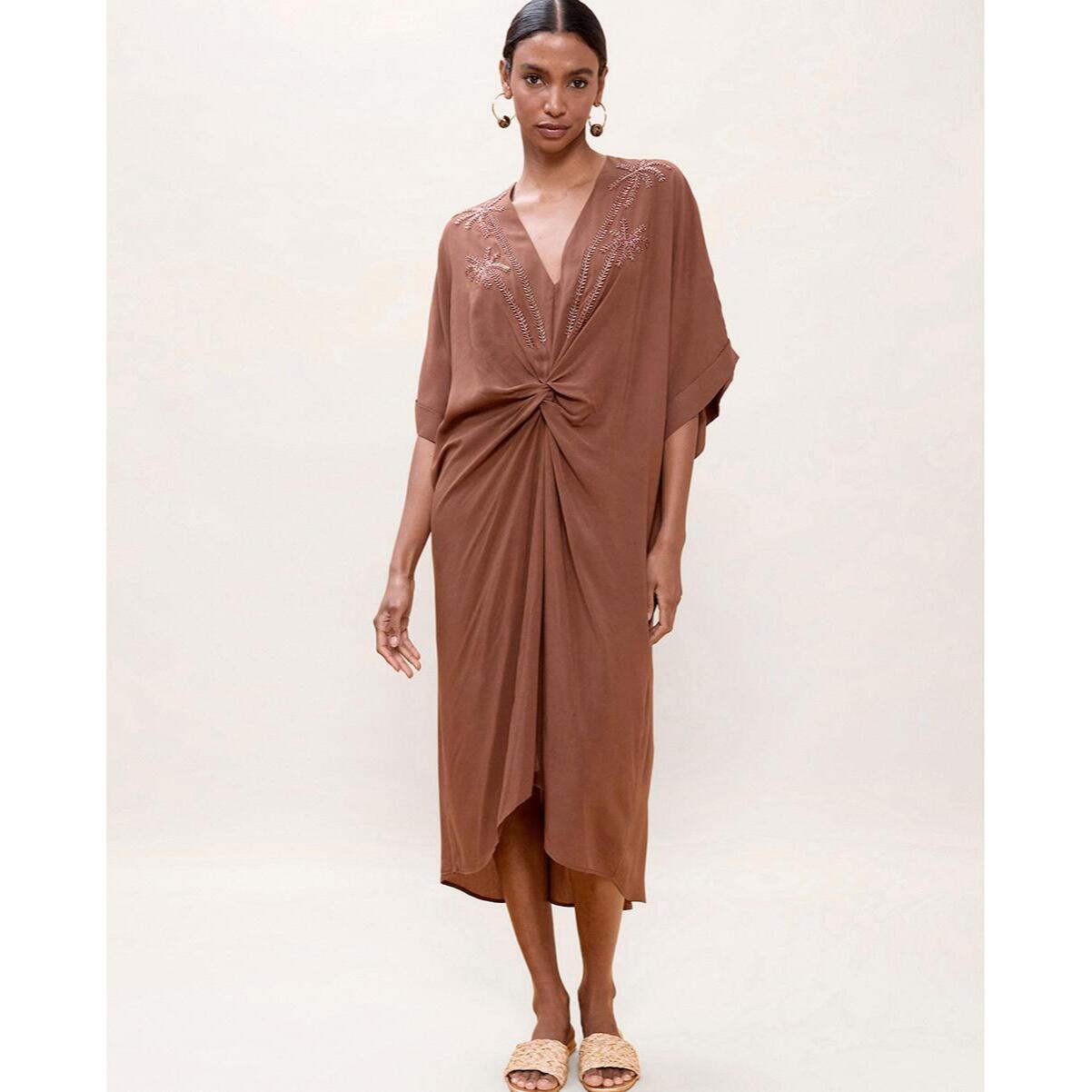 Abito midi in lino annodato