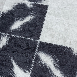 FIESTA - Tapis patchwork imitation peau noir et blanc