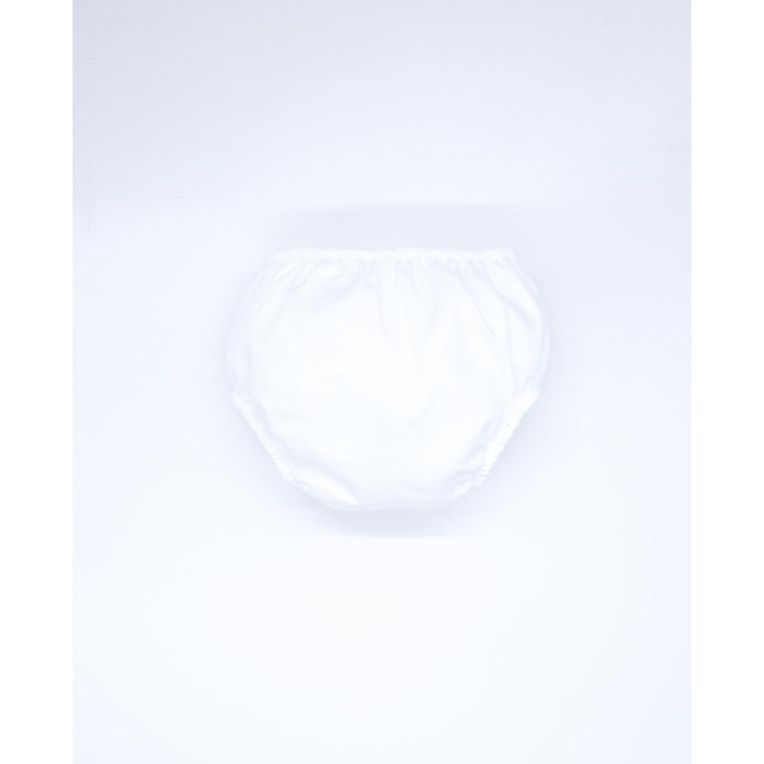 Cubrepañal de popelin blanco. Elastico en la cintura y en las piernas.