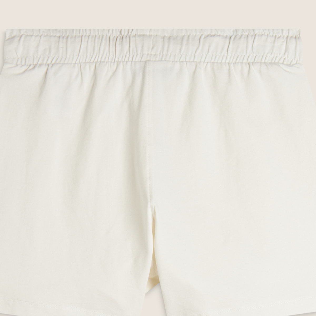 Pantaloni corti in jersey con grafica dorata