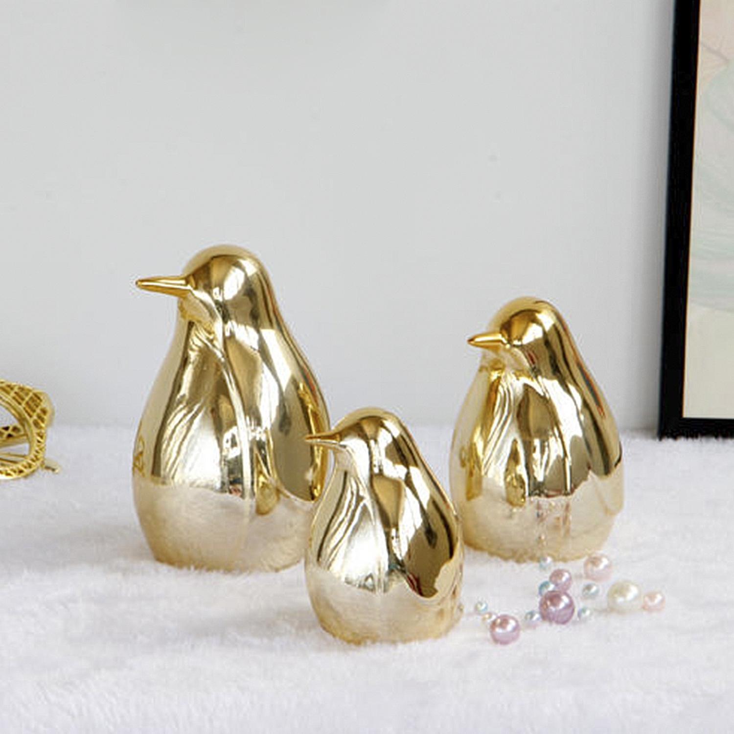 DAM Set de 3 Piezas Figuras Decorativas de Porcelana Dorada Pinguinos 10x13x11 Cm. Color: Oro