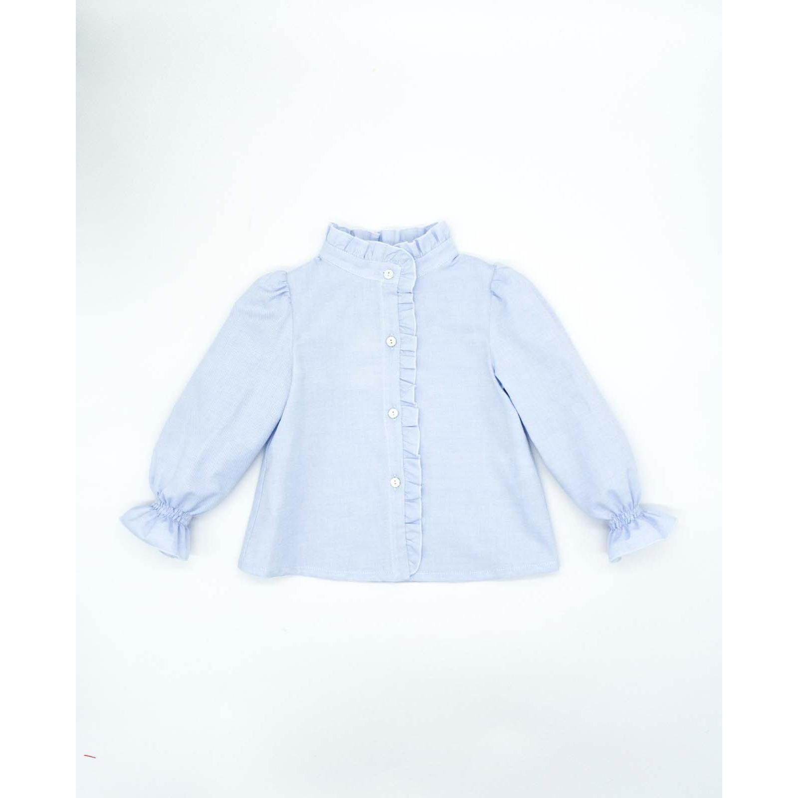 Camisa azul con volantes