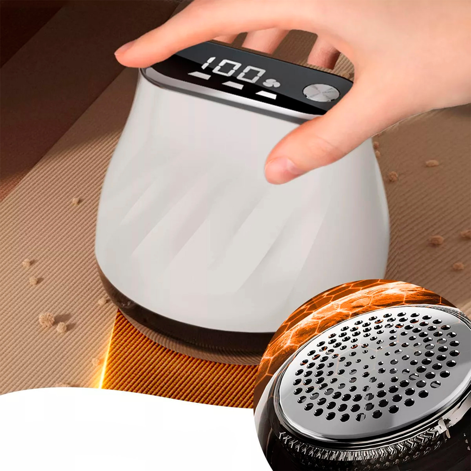 Rasatore portatile per pelucchi, con design ergonomico compatto. Dispone di uno schermo LCD e tre livelli di potenza.