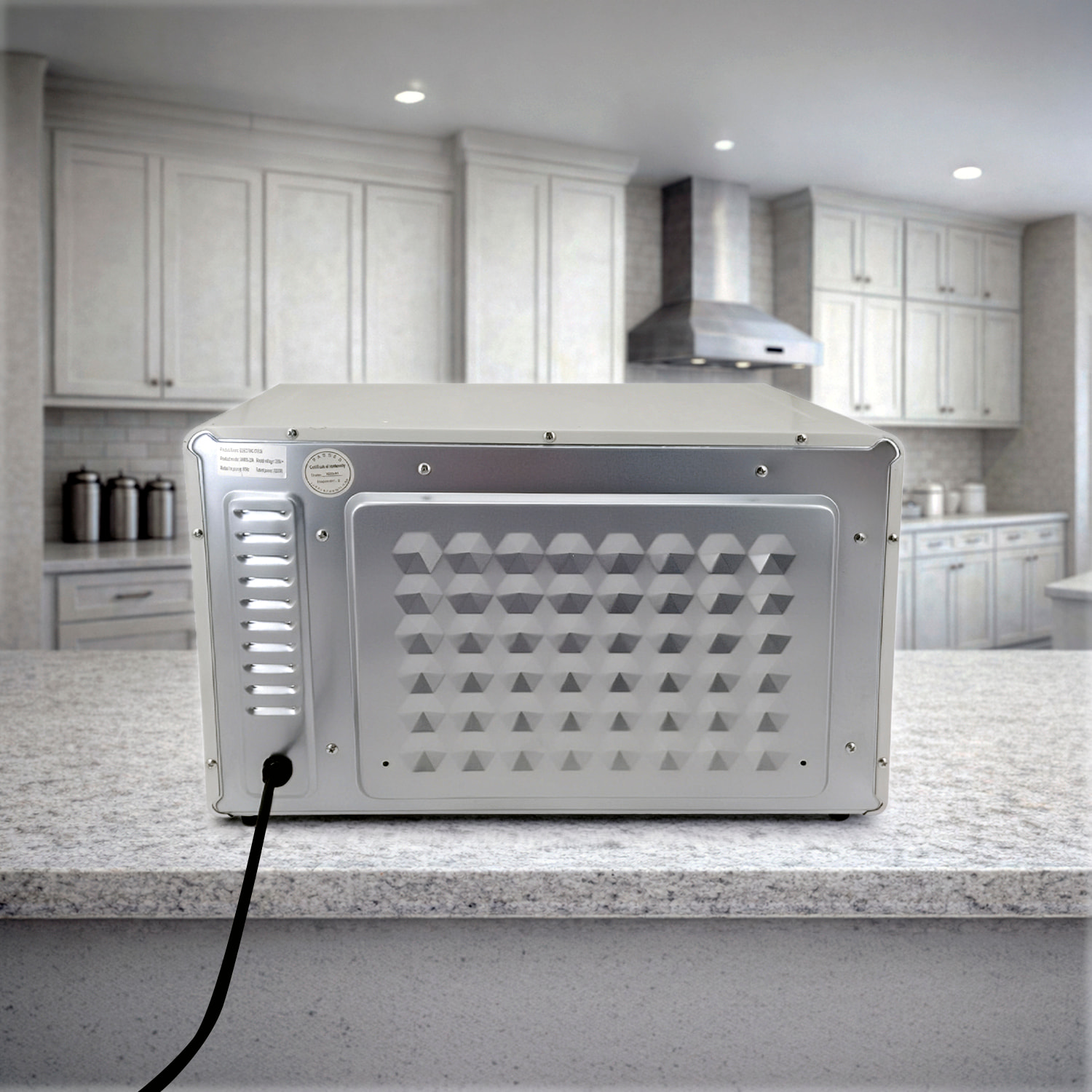 Horno eléctrico de sobremesa con 25 litros de capacidad. Panel de control mecánico y 1300 W de potencia.