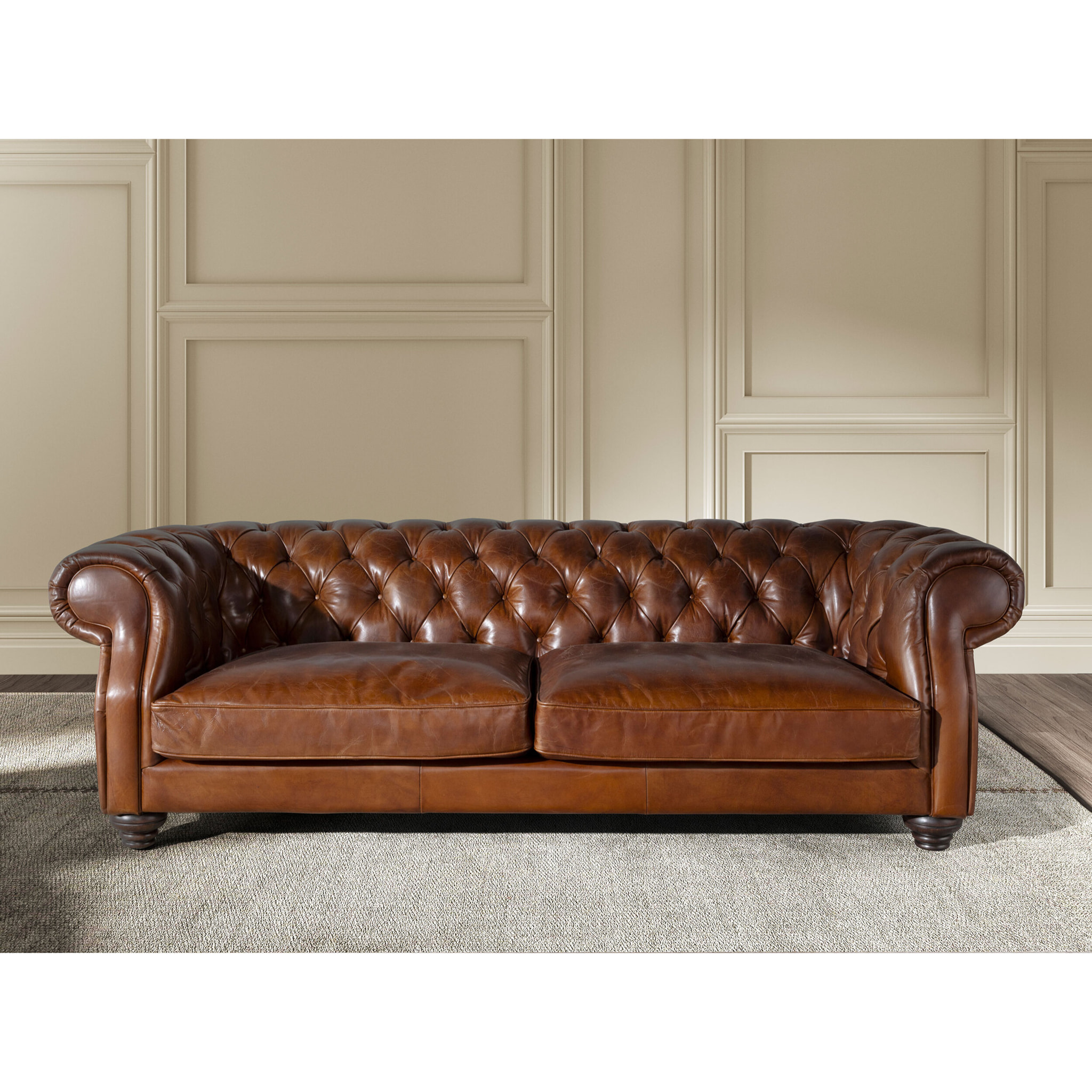 Sofá Chester de 3 plazas tapizado en piel de origen vacuno en marrón coñac patas de madera maciza tintada en caoba 226x101x70cm