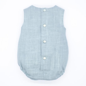 Pelele de lino verde. Con pliegues en el delantero y botones de decoracion.