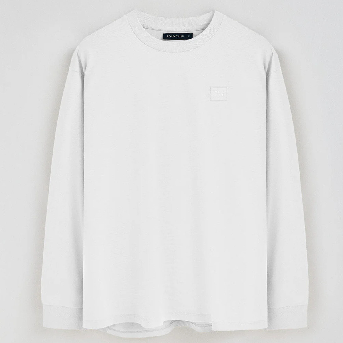 Camiseta blanca holgada con detalle Polo Club