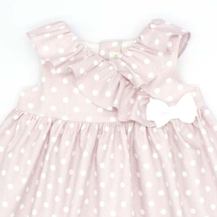 VESTIDO CON VOLANTE ROSA LUNARES BLANCO