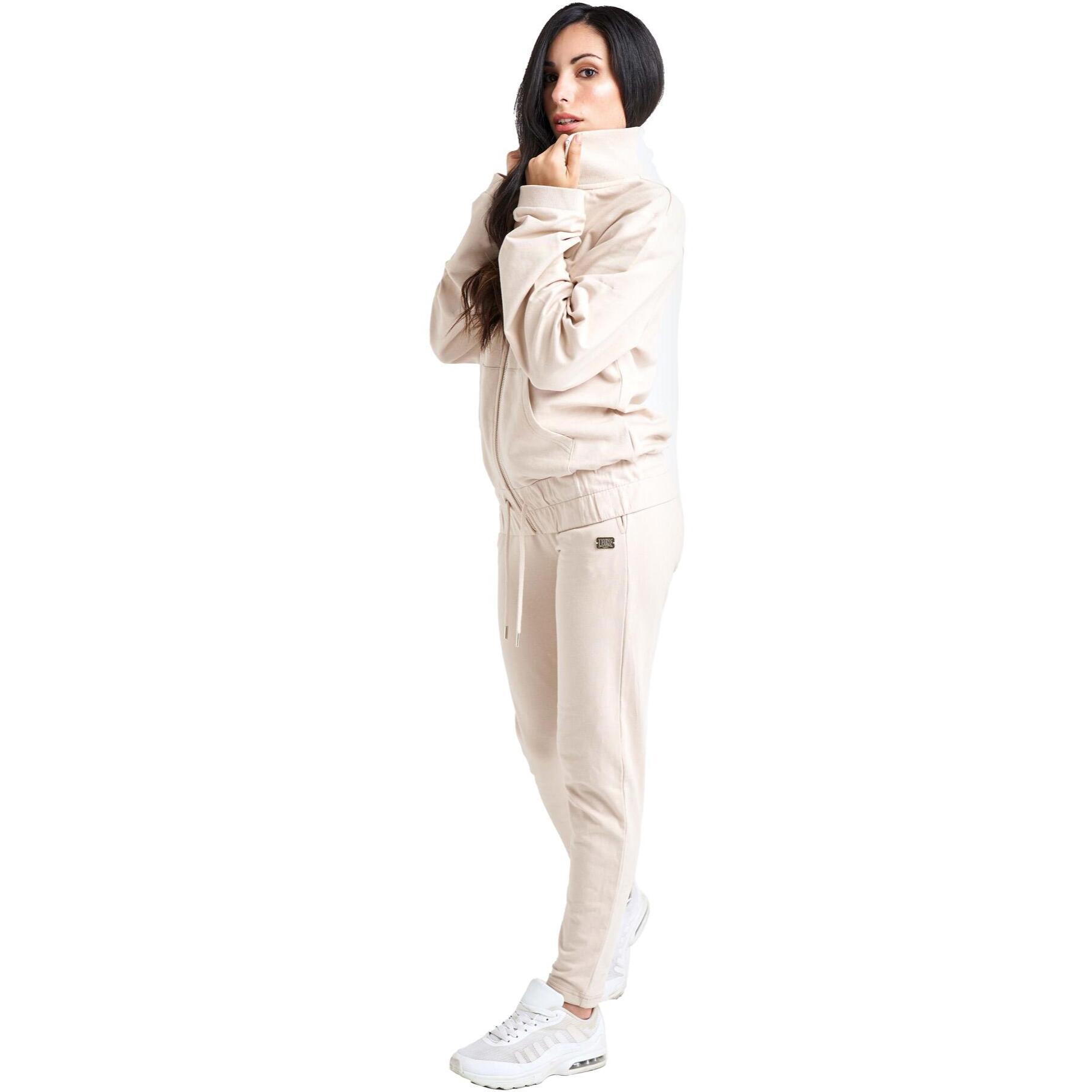 Chándal Chic Boxing para mujer con cuello alto y cremallera.