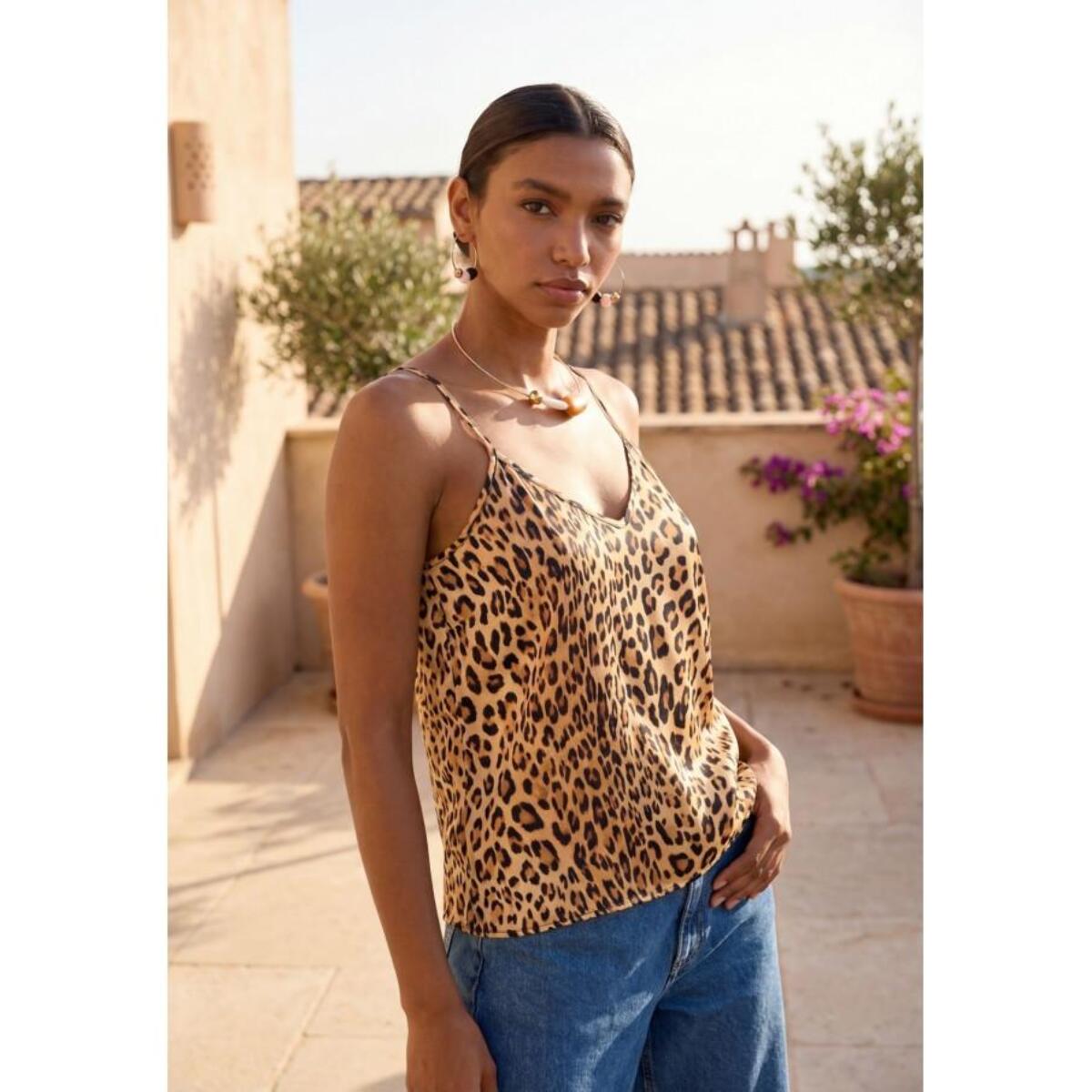 Top in pizzo con stampa animalier