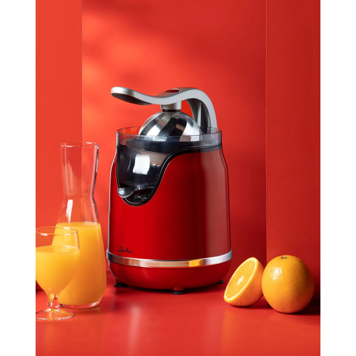 Exprimidor de naranjas eléctrico JATA JEEX1059 con brazo. Lleva 2 conos