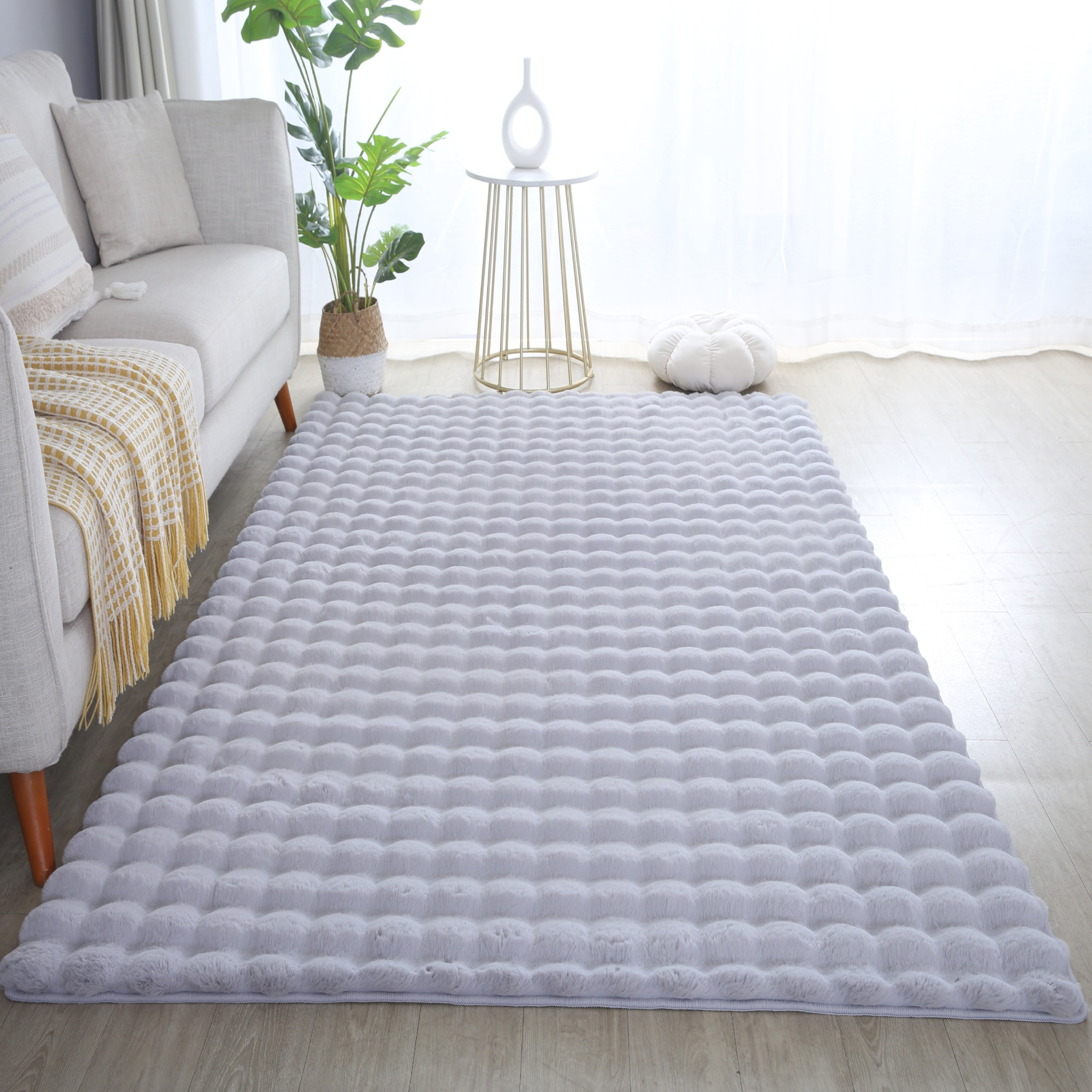 LAPONIE - Tapis uni doux en relief Gris