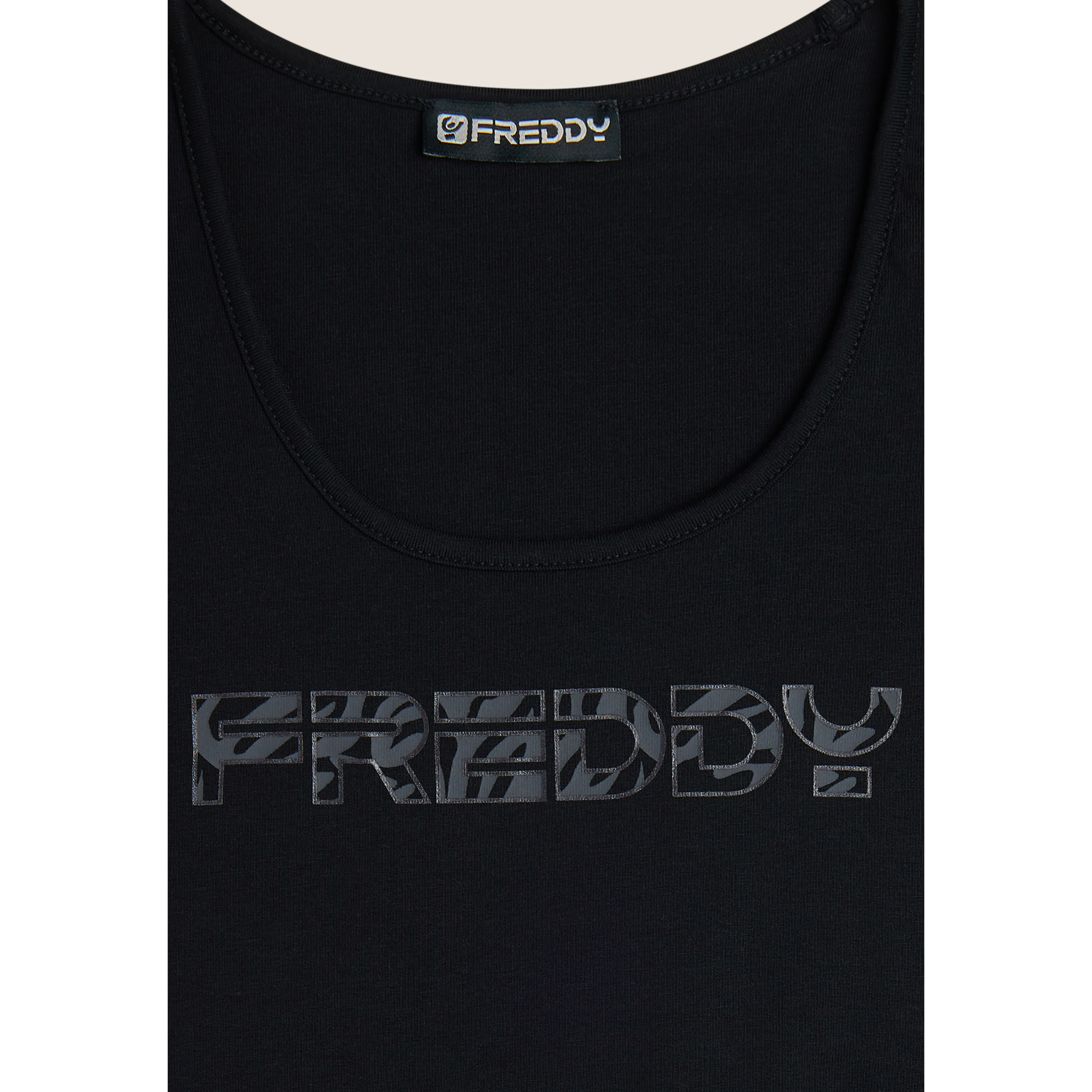 Reggiseno sportivo con sostegno medio e logo floreale