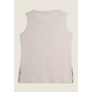 Canotta con fondo svasato e grafica con borchie