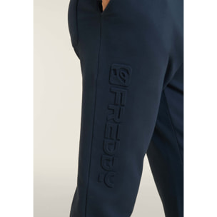 Pantaloni slim in interlock con maxi logo in rilievo