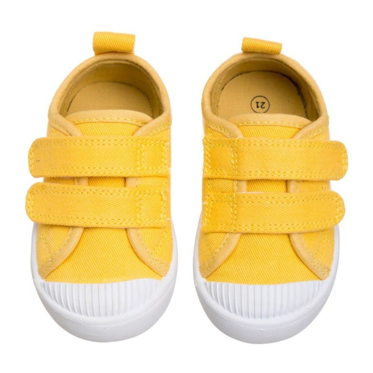 Lona color amarillo, fácil de combinar, con dos Velcros, puntera de goma y gran flexibilidad