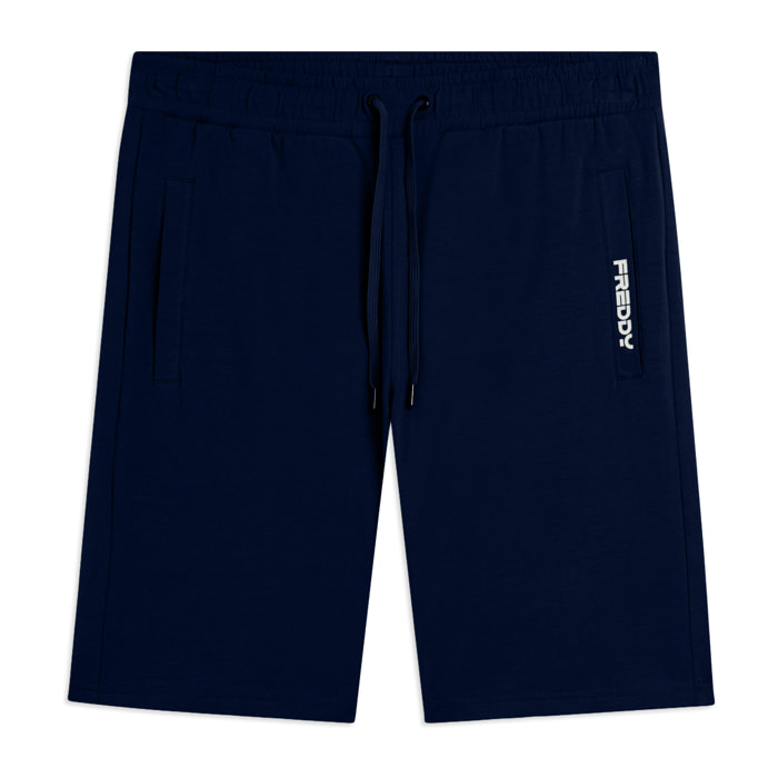 Pantaloni corti in jersey stretch con taschino