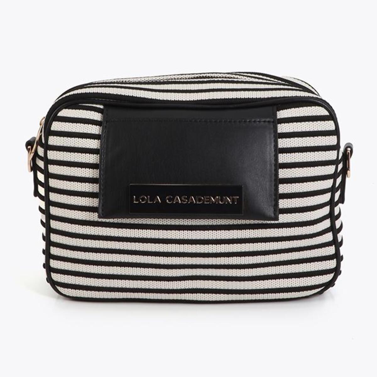 Tessuto a righe incrociate abbinato ad effetto pelle