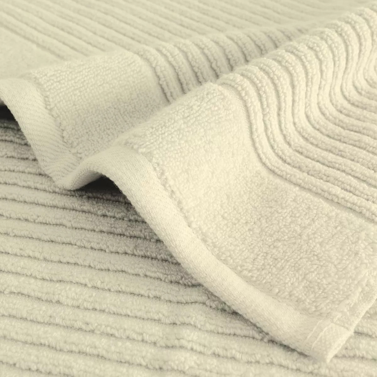 Serviette eponge pur coton 560 g/m² uni ecru Vitae blanc casse