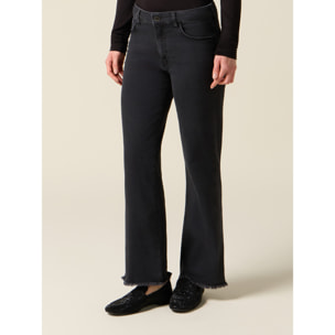 Oltre - Jeans acampanados negros con dobladillo deshilachado - Negro