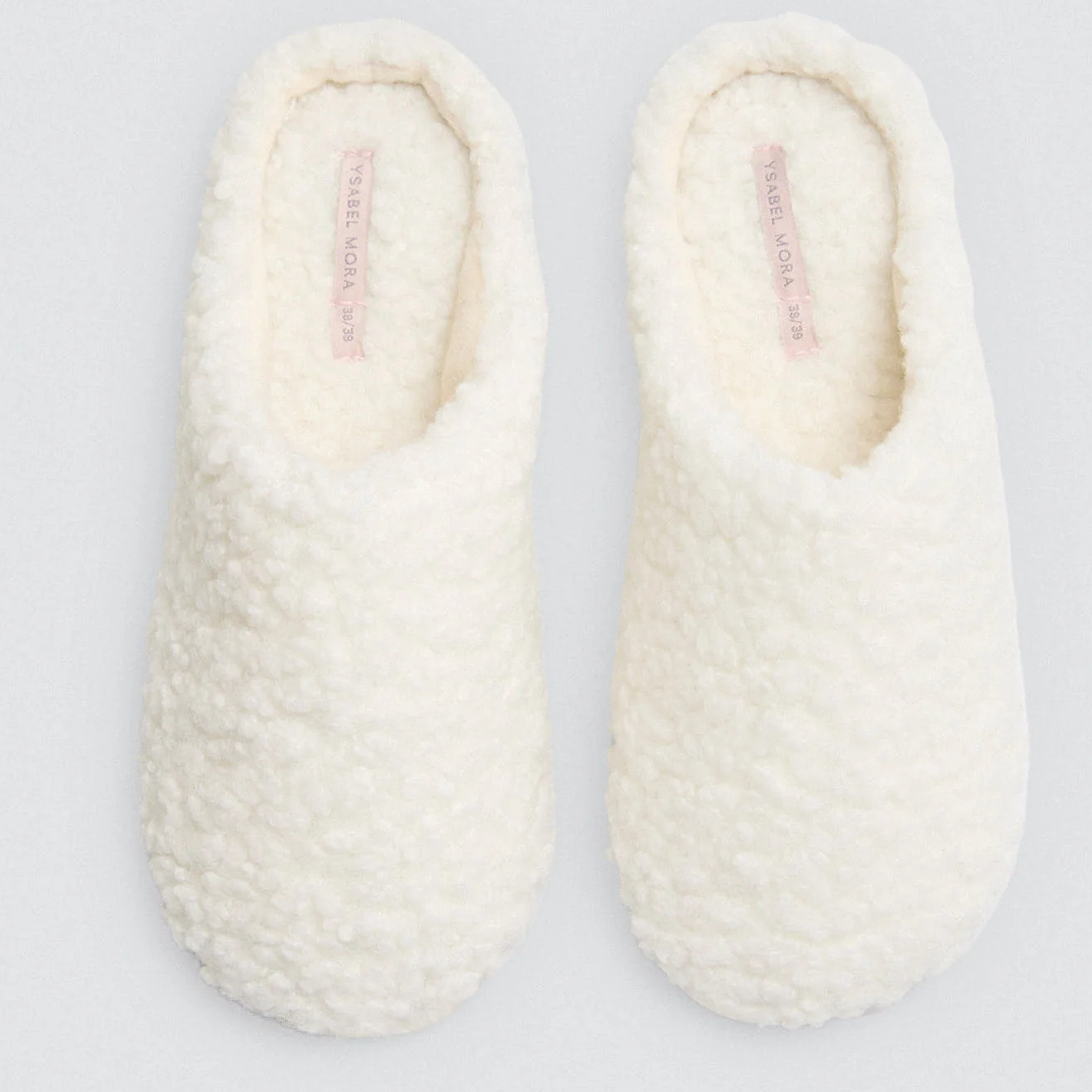 Pantofole di pelle di pecora bianca