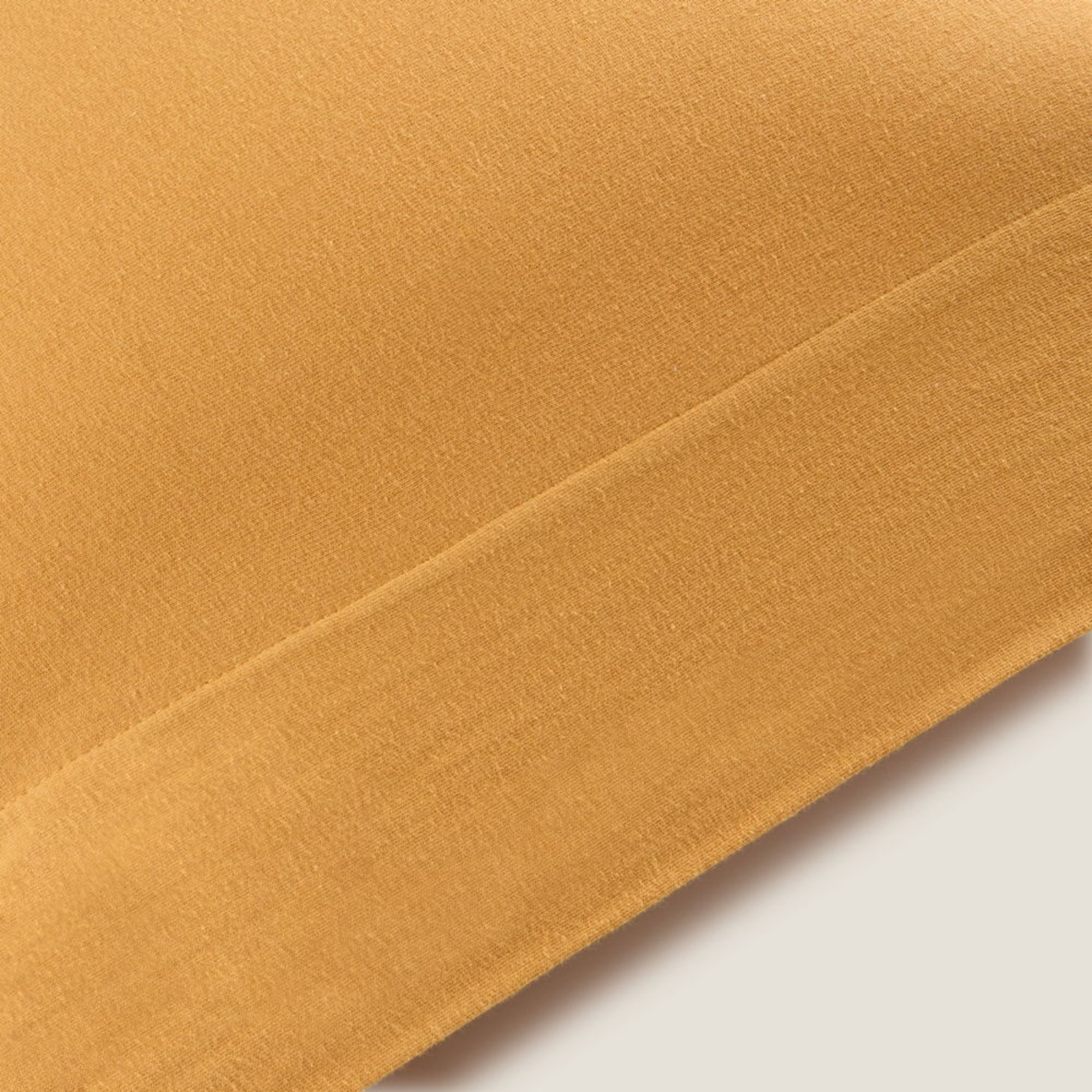 Funda almohada punto algodón BCI sostenible Puntib color amarillo mostaza Punto de algodón