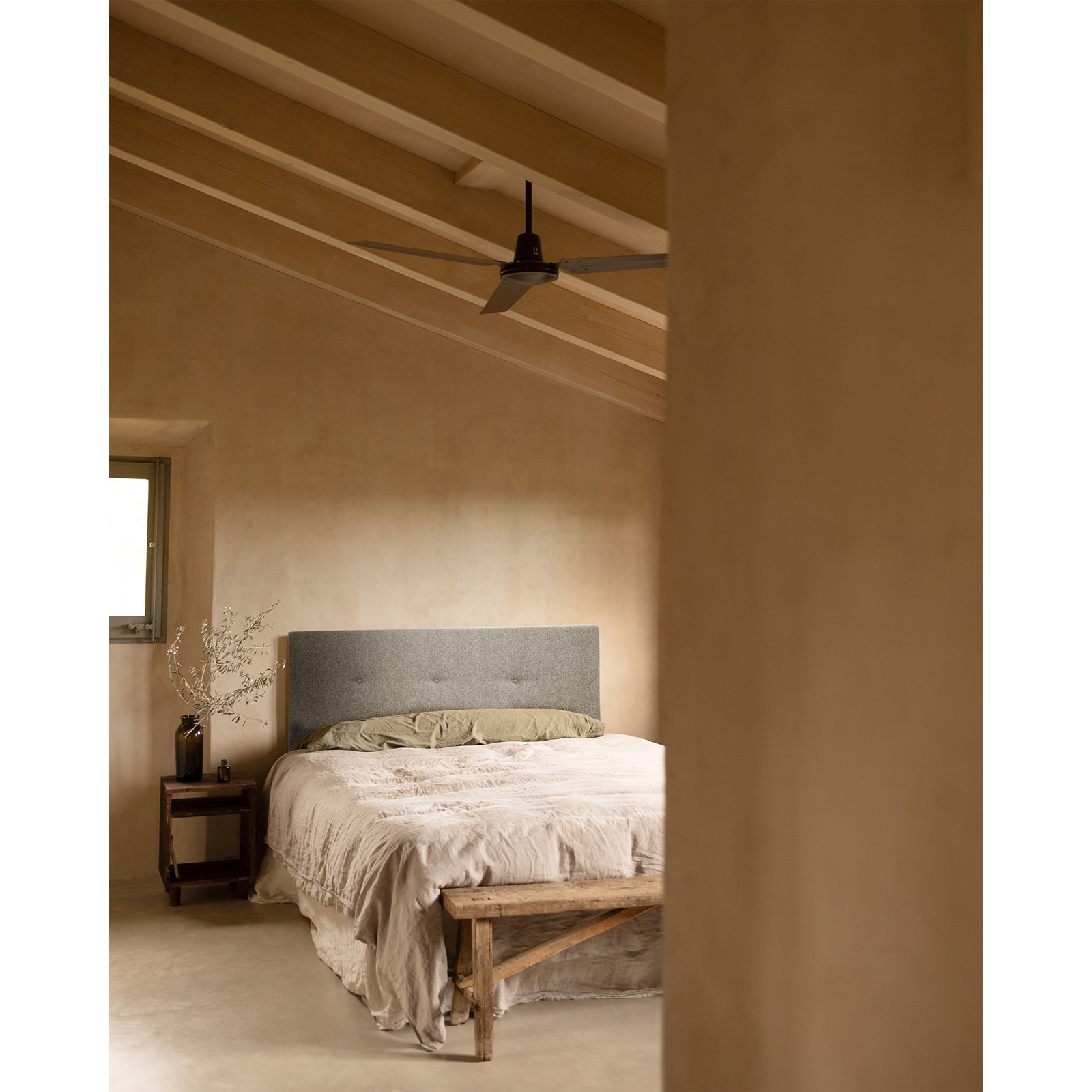 Cabecero tapizado de poliester botones en color gris de varias medidas