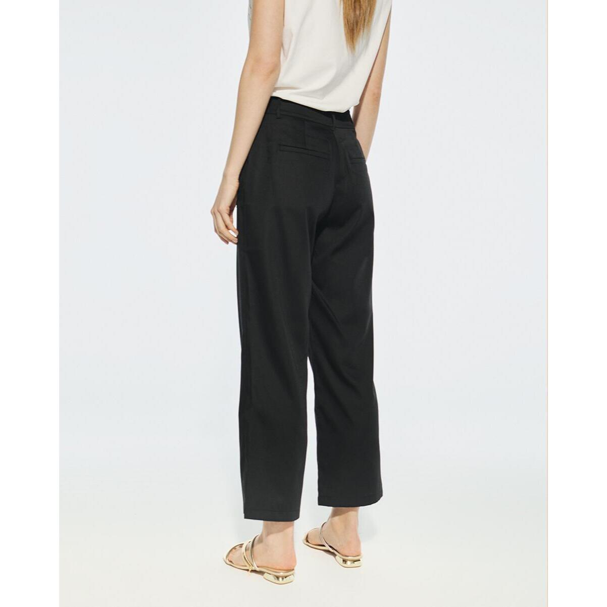 Pantaloni dritti con borchie
