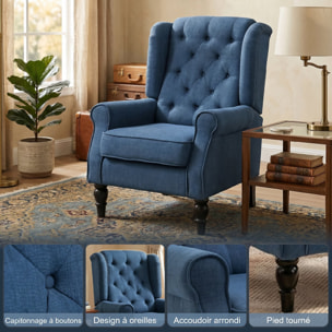 Fauteuil à oreilles style Chesterfield dossier capitonné grand confort bois noir tissu bleu