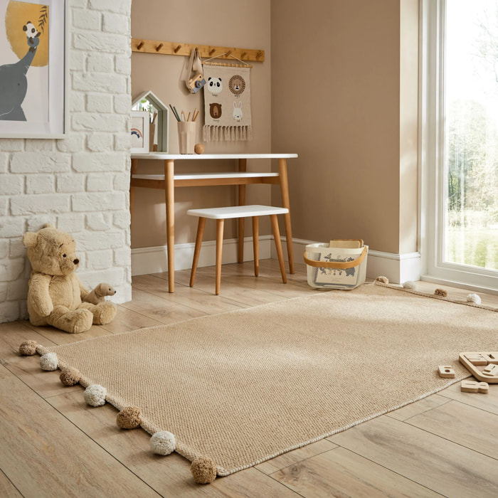 Tapis à pompon chambre enfant Beige