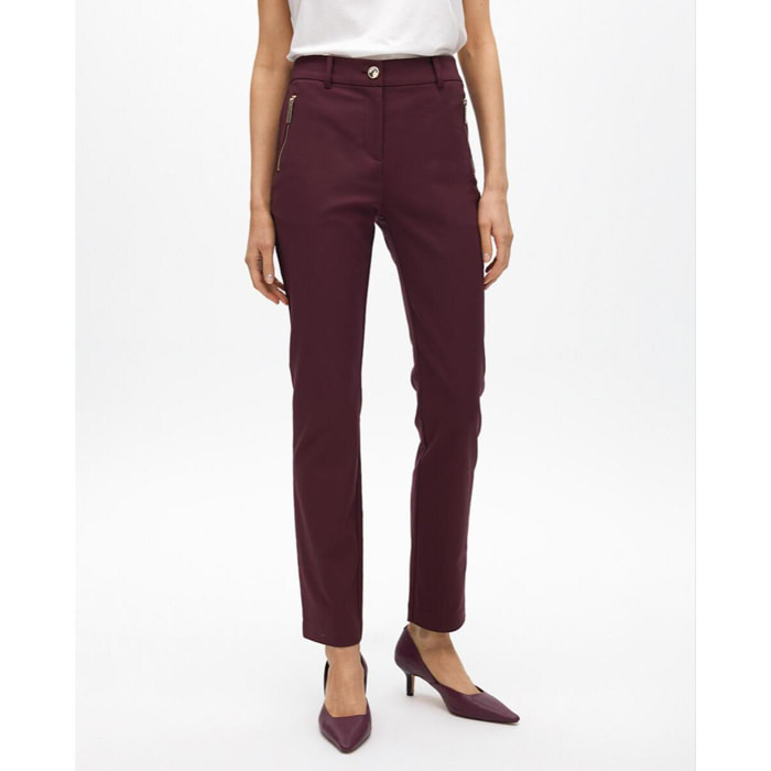 Pantaloni con tasche con zip in tessuto elastico