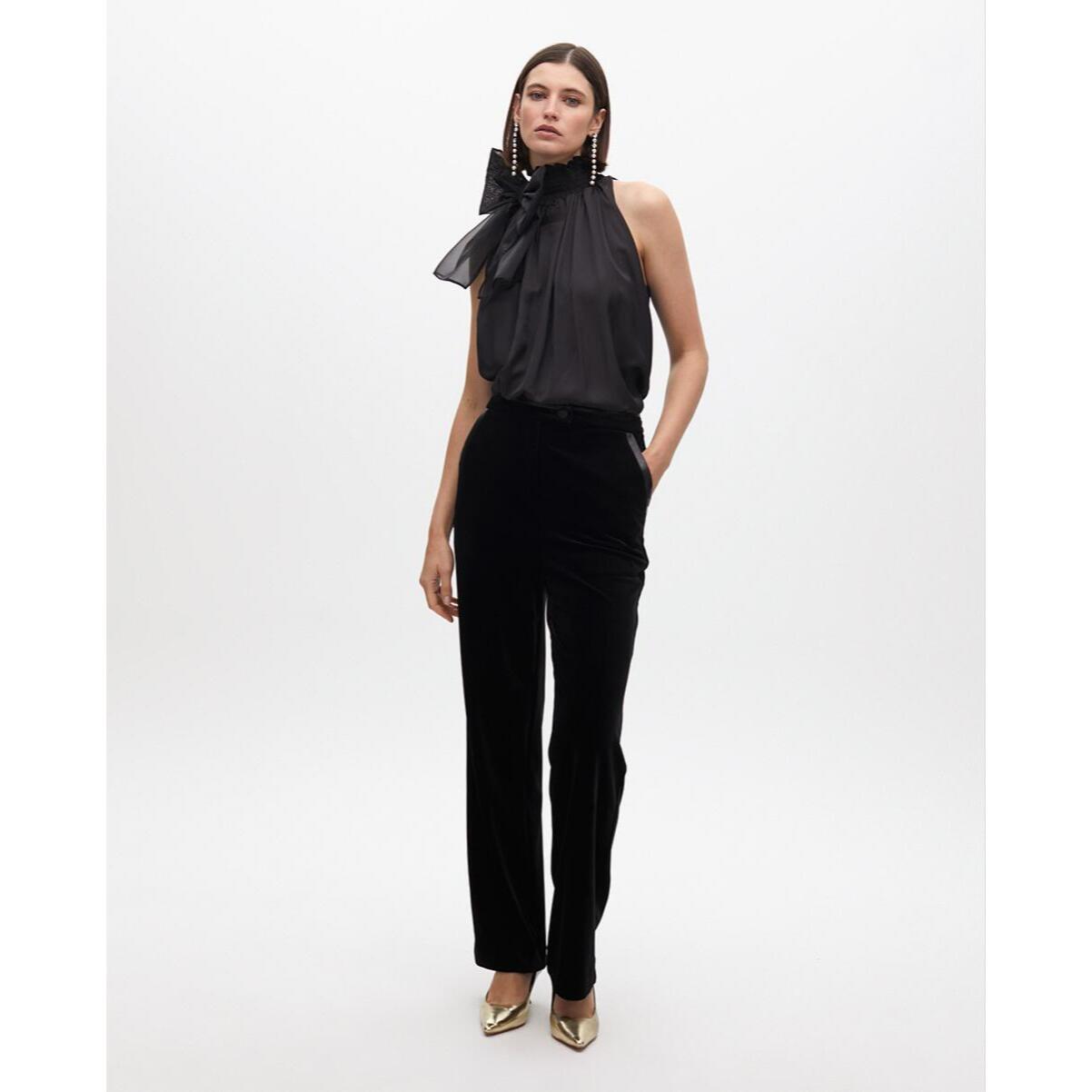 Pantaloni dritti in velluto con dettagli in eco pelle