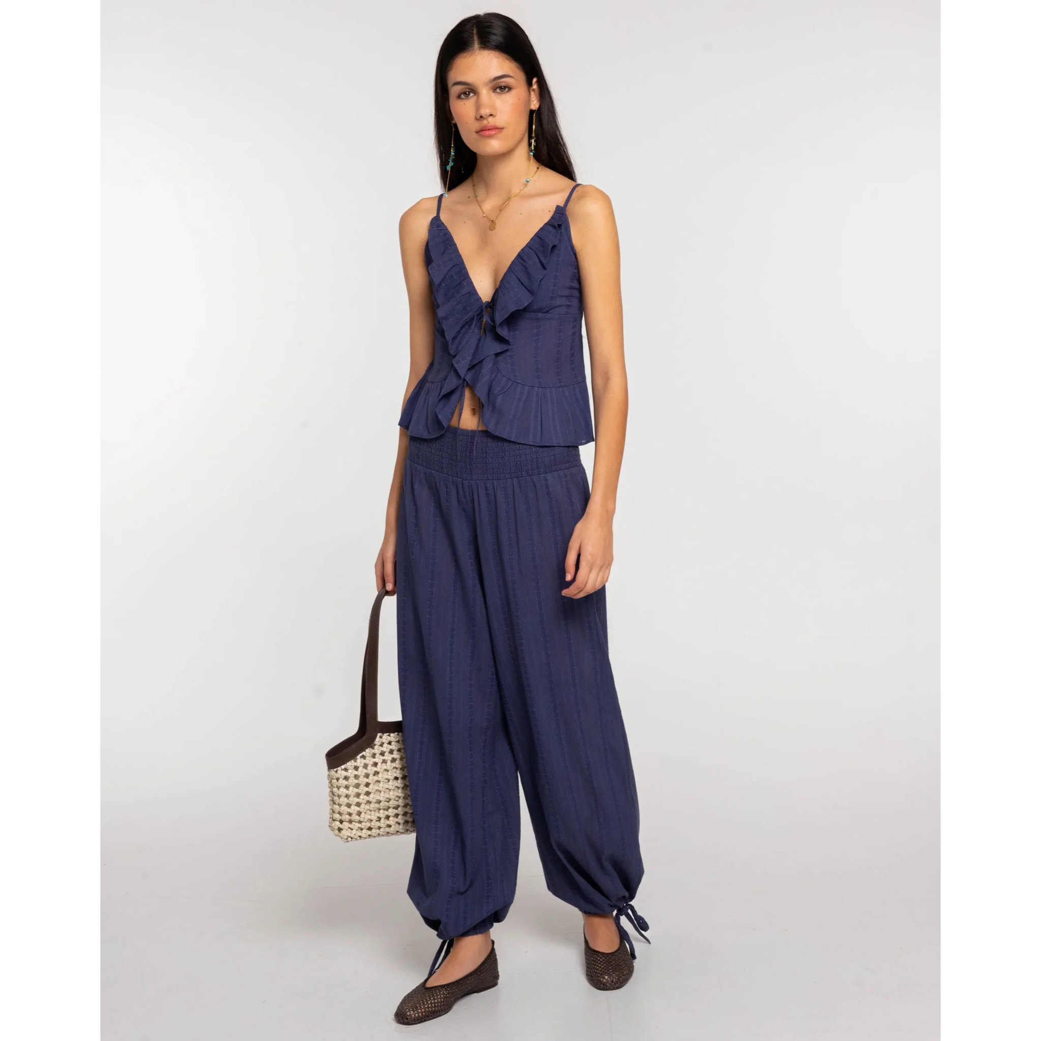 Pantalón recto con bajo ajustable de mujer