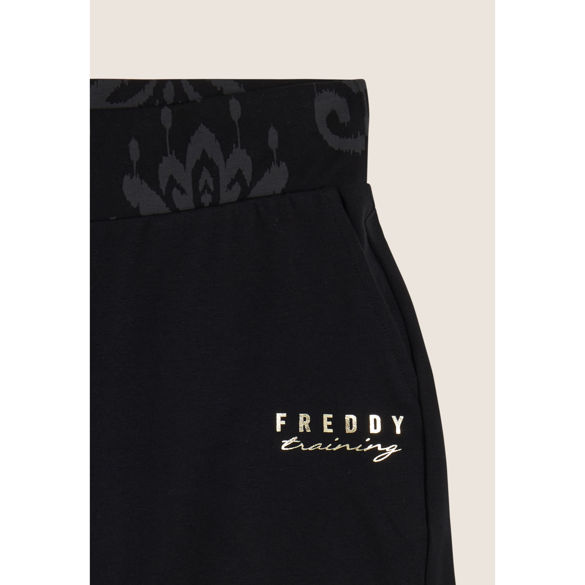 Short sportivi con fascia in vita floreale