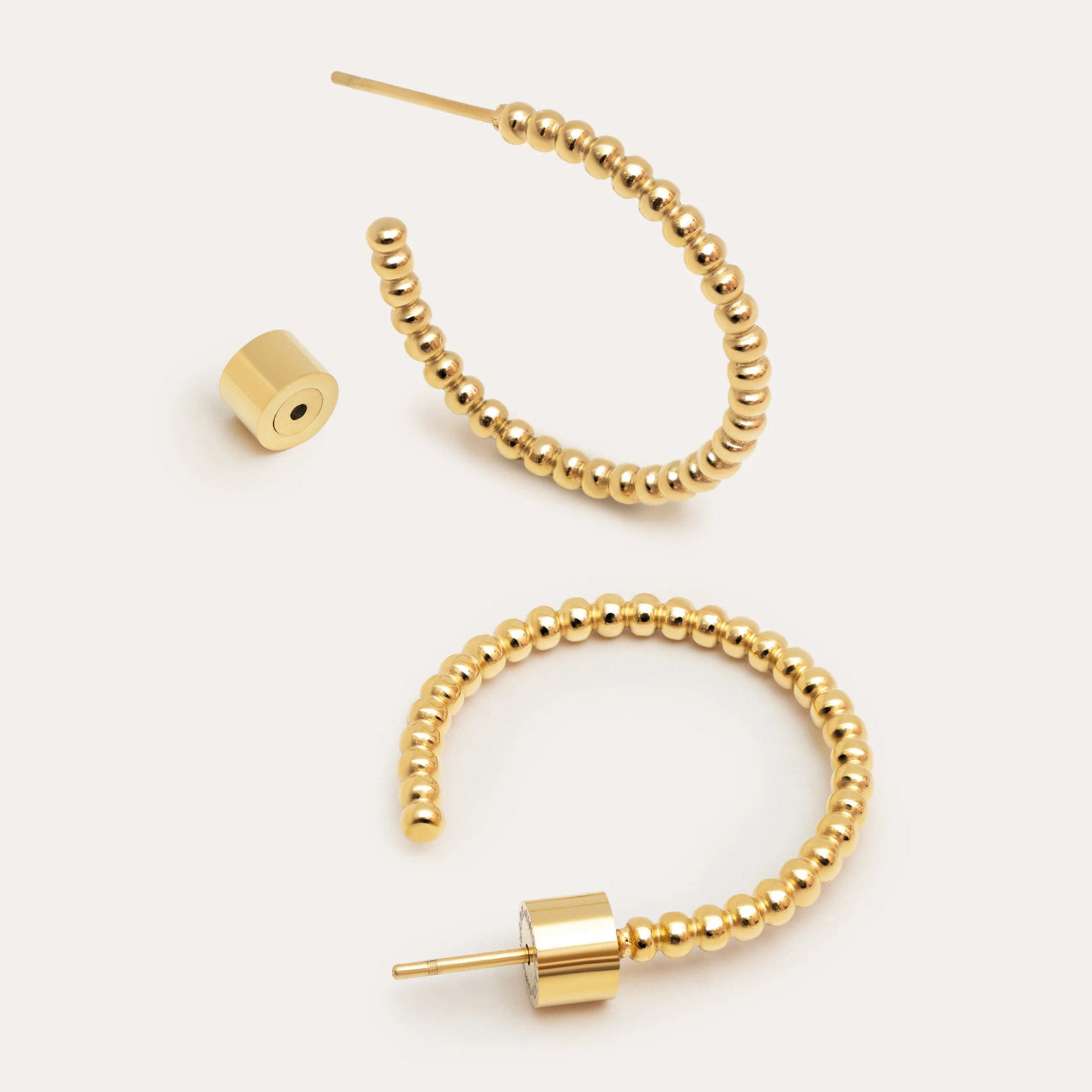 Orecchino Pebble Dots M  in Acciaio Placcato Oro