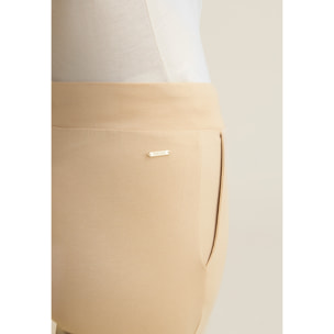 Pantaloni regular con spacchi e coulisse animalier