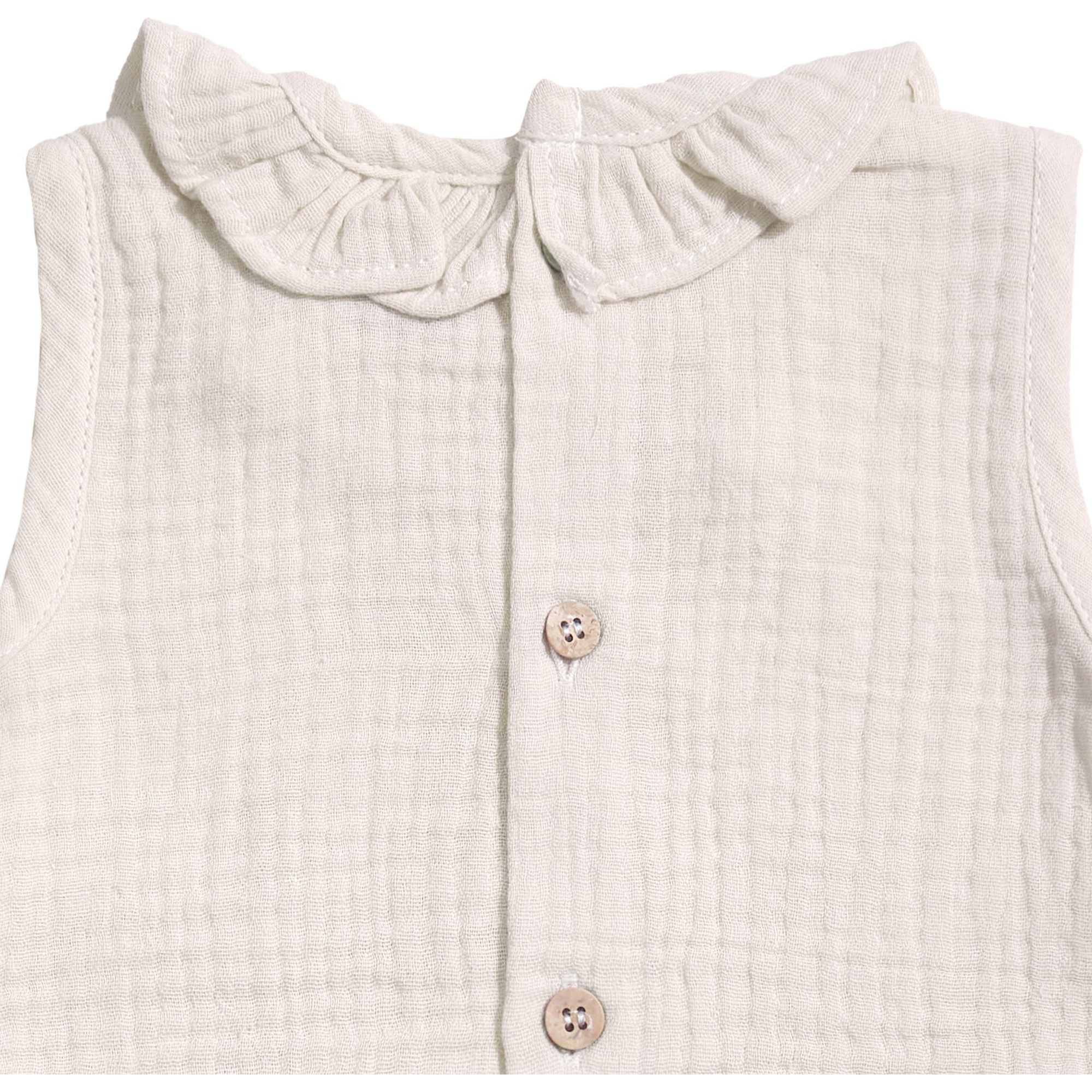 Body bebé sin mangas cuello bambula