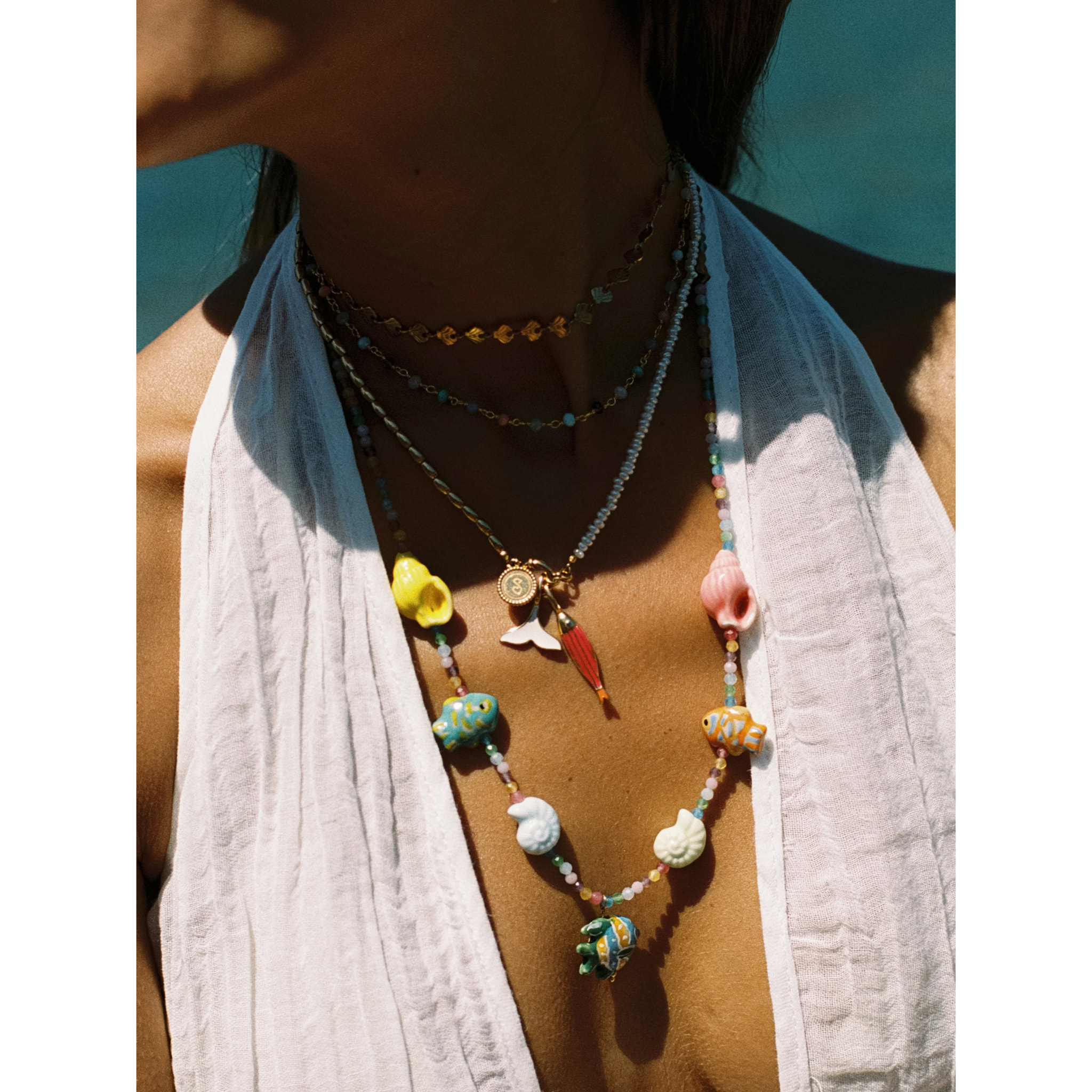 Charm Seaglow Fish Baño Oro